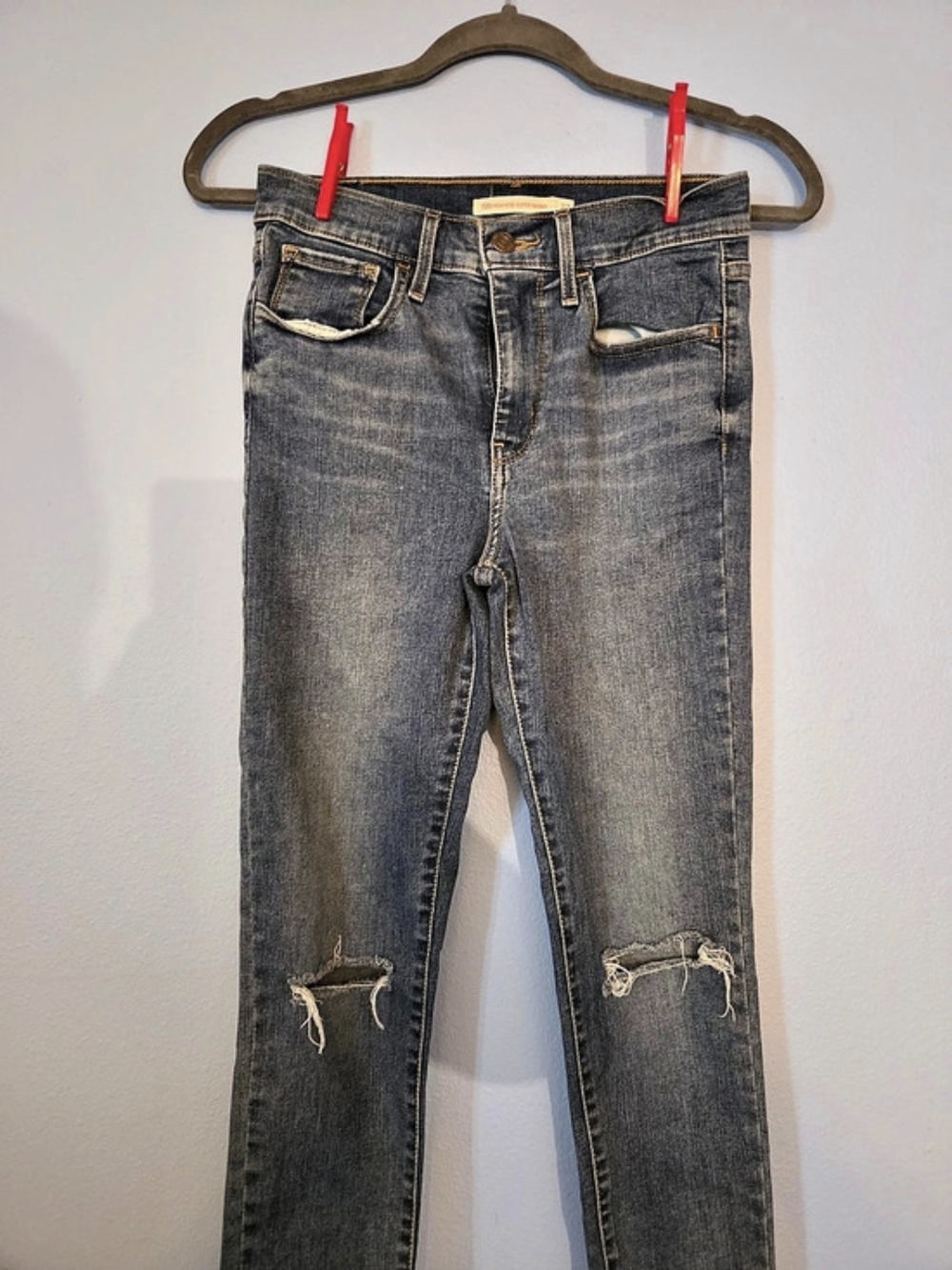 Levi Strauss & Co. 720 High Rise Super Skinny. Distressed Skinny Jeans Blue
